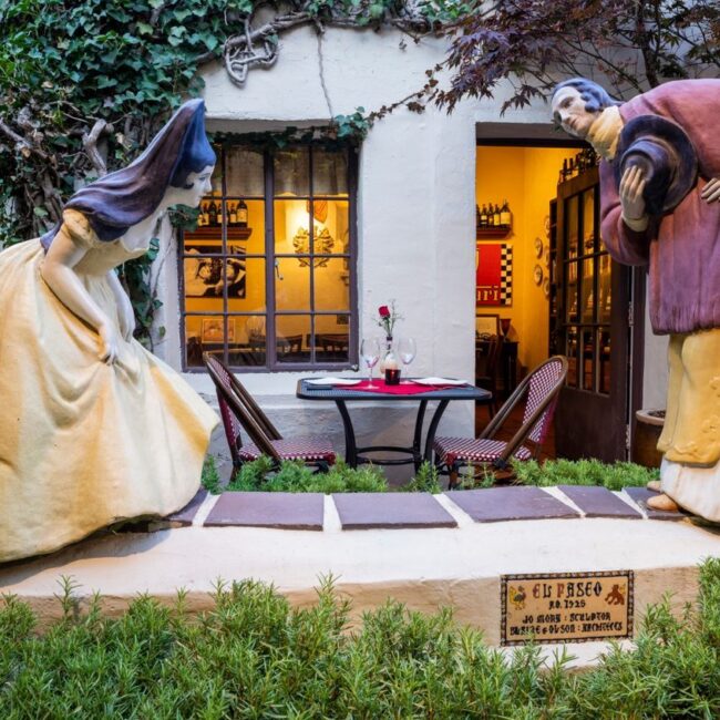Jo Mora's 1928 sculpture The Greeting in the El Paseo courtyard at Little Napoli