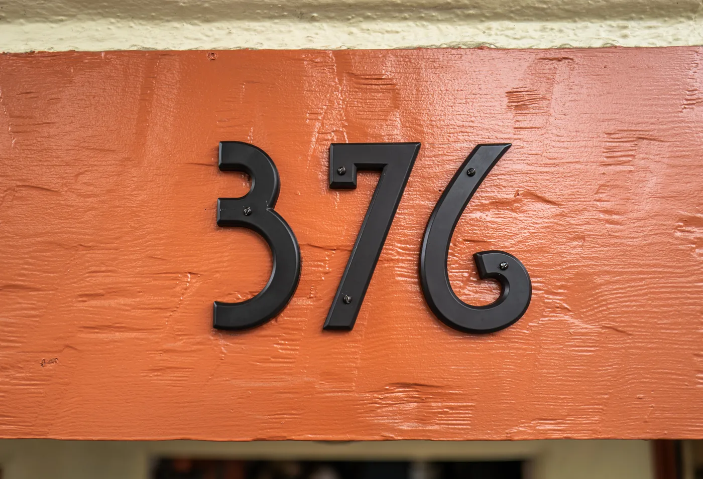 The new 376 numerals on the bakery's orange fascia
