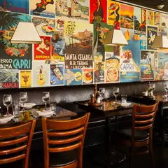 The Vesuvio dining room and its poster wall.