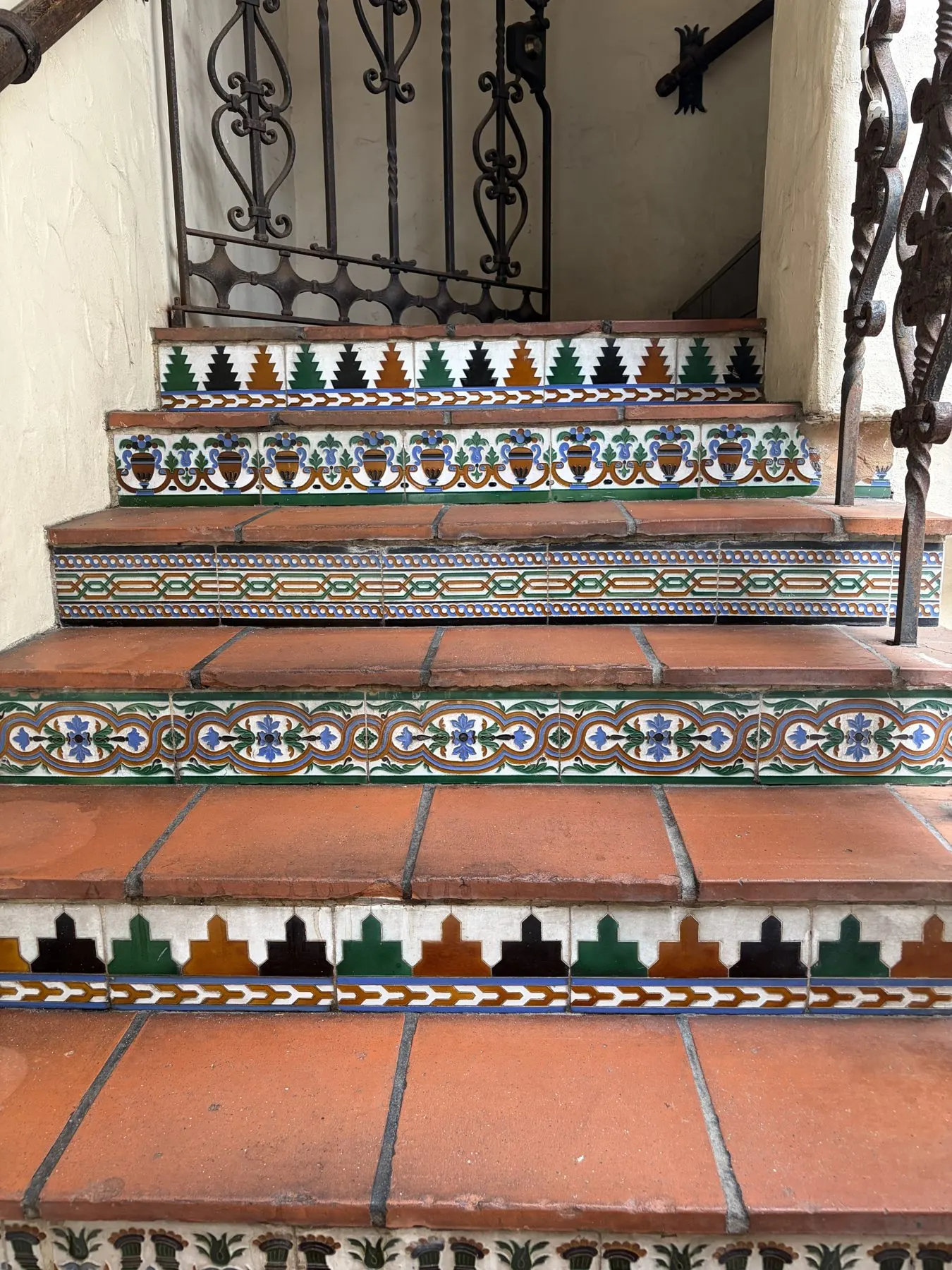 The El Paseo Building steps, with patterned 1928 Spanish tile on the risers